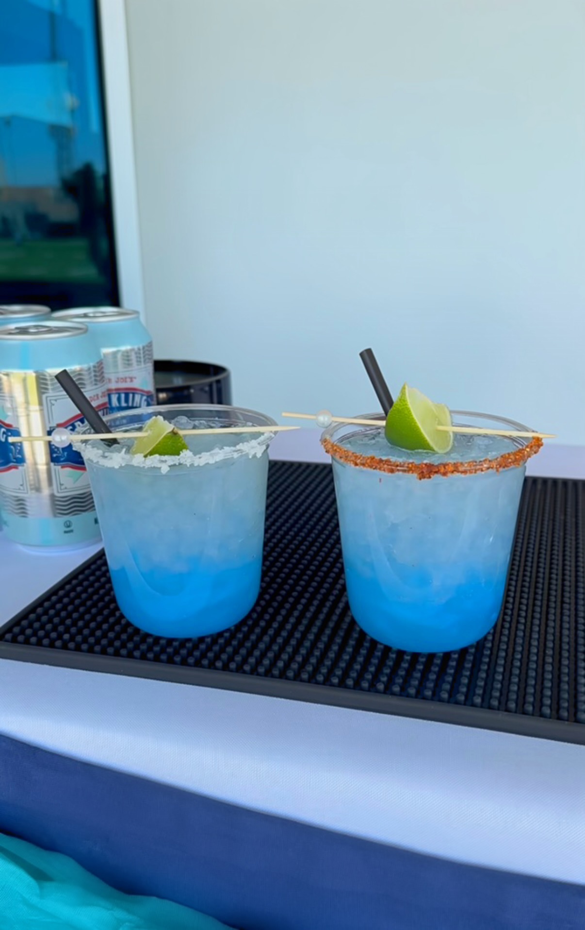 Blue cocktails with lime and salted rim